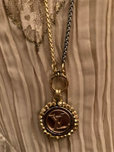 LV button necklace