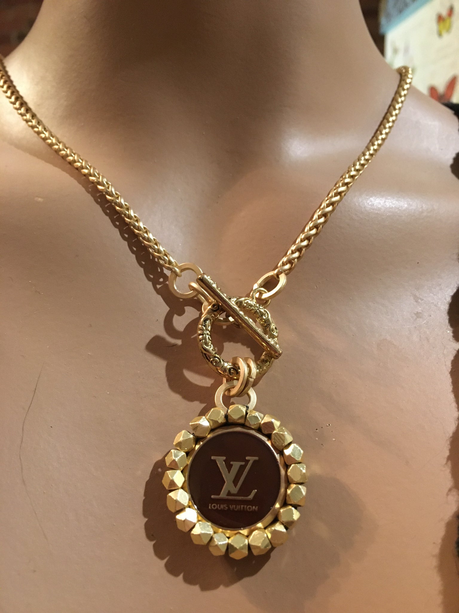 LV button necklace