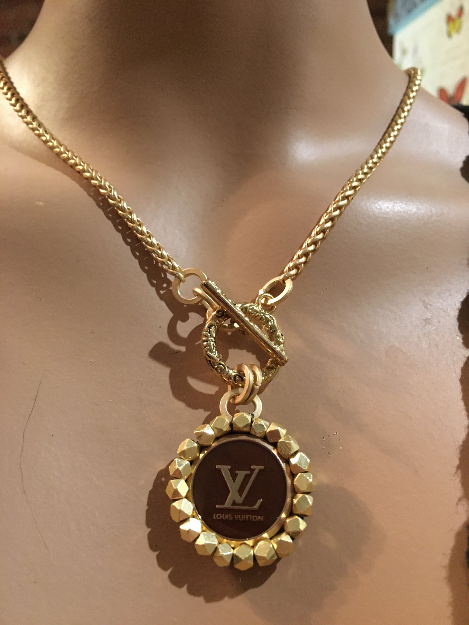 louis vuitton gold button