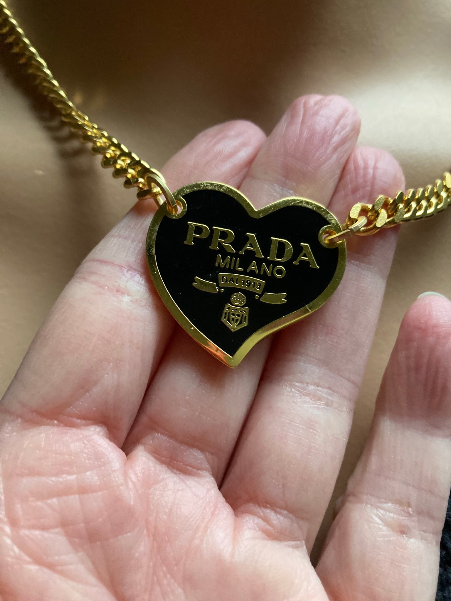 Authentic Prada gold and black large bear pendant - Repurposed and con –  Reluxeandco