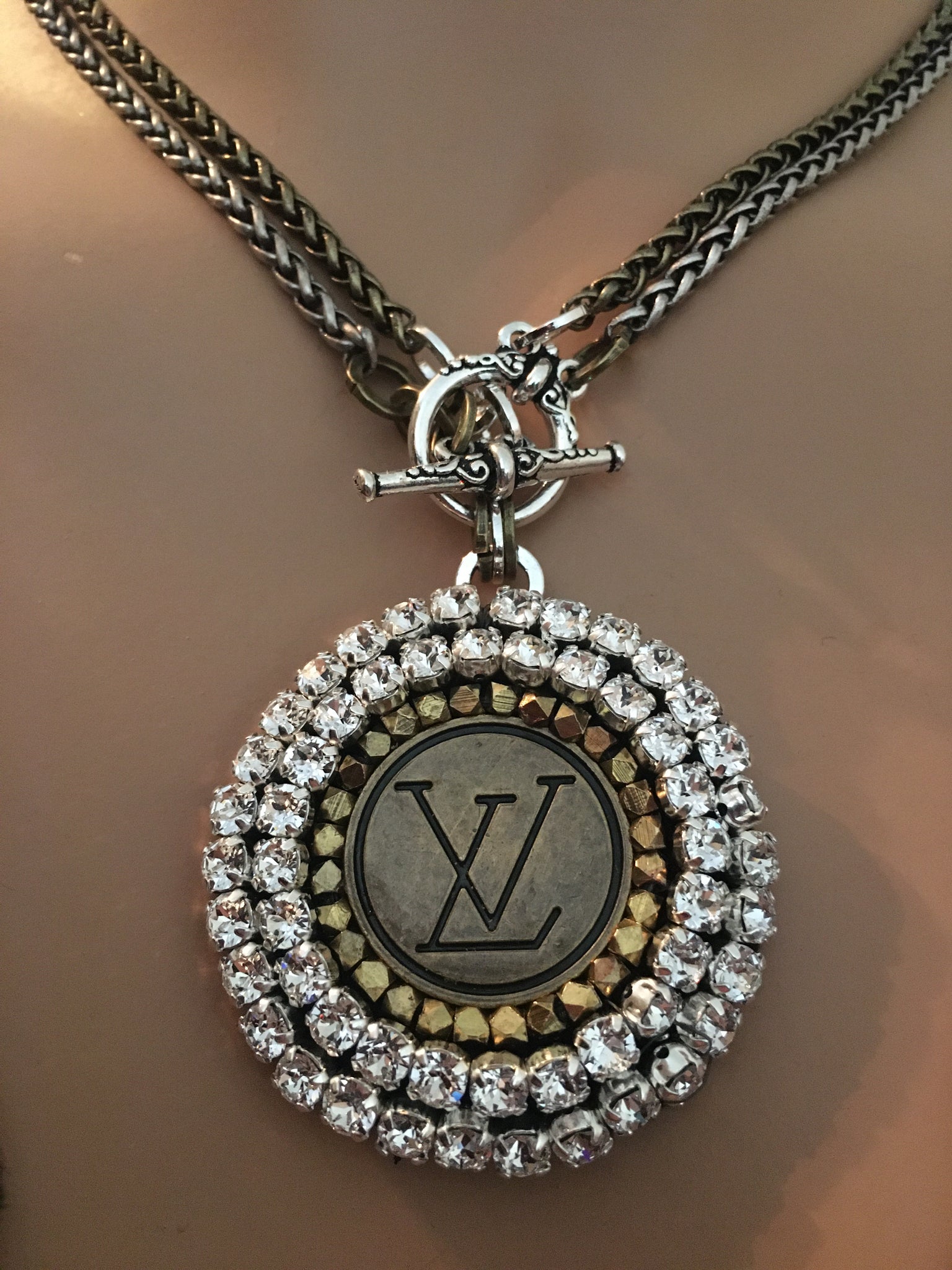 LV button necklace